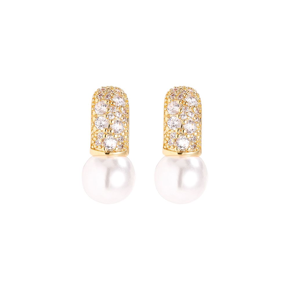 Gold earrings with pearl and sparkling cubic zirconia detail.