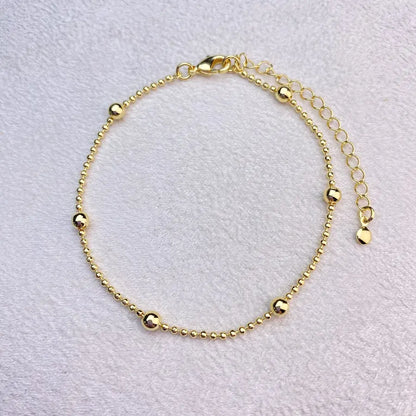Pulseira Dourada com Bolinhas em Banho