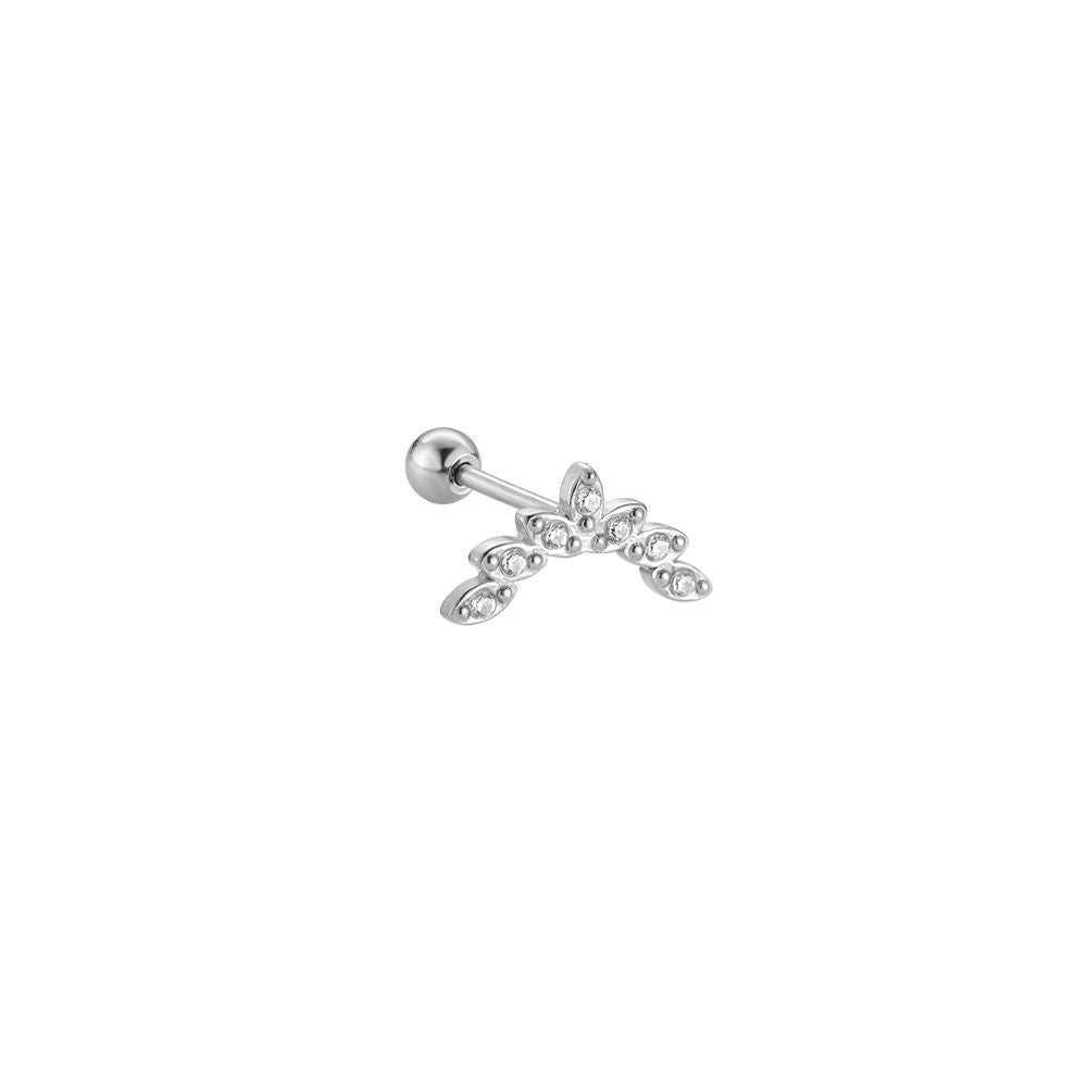 Gold-plated ear piercing with cubic zirconia stones.